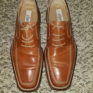men tan leather shoes